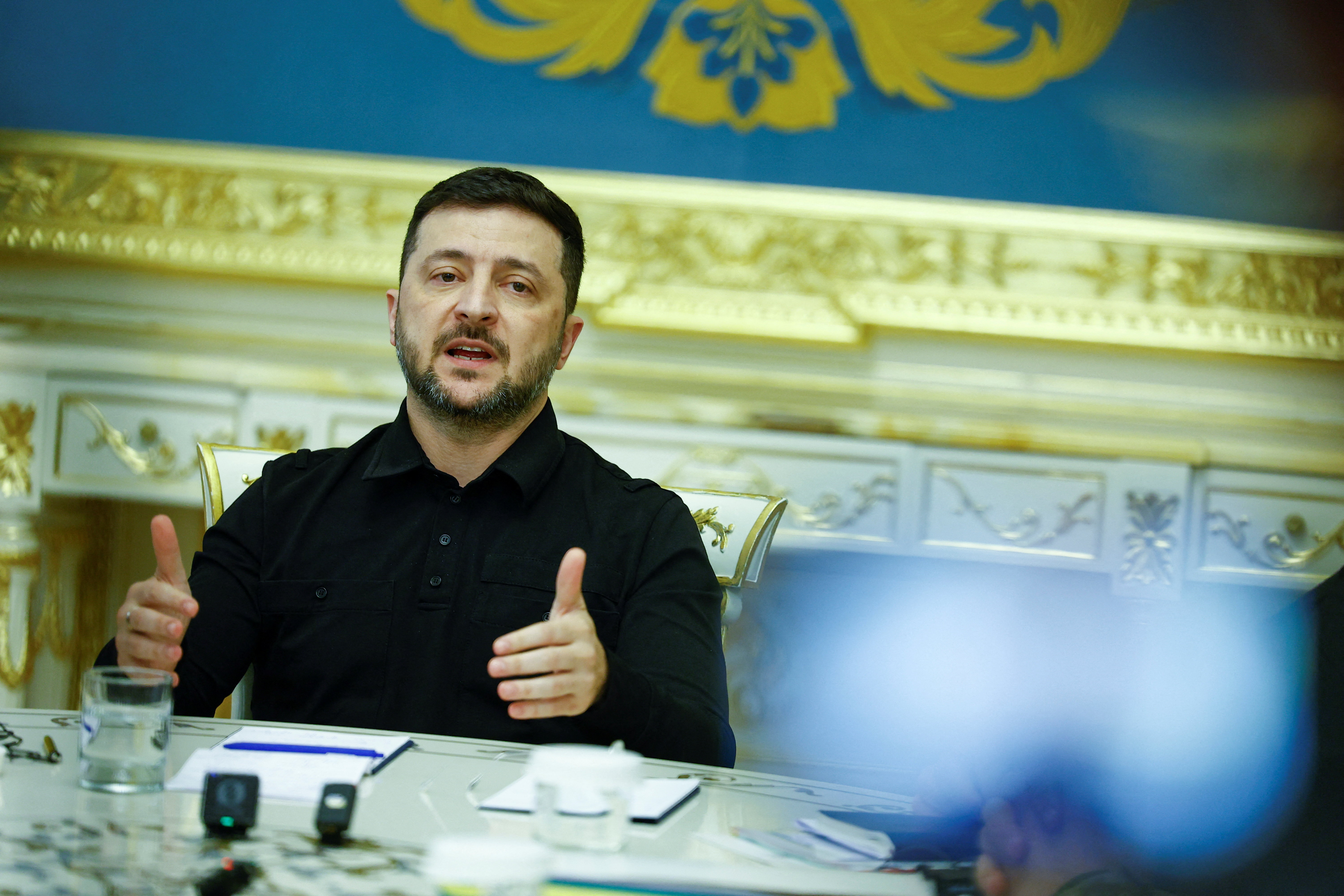 Ukraine's President Zelenskiy speaks during a meeting with the media in Kyiv