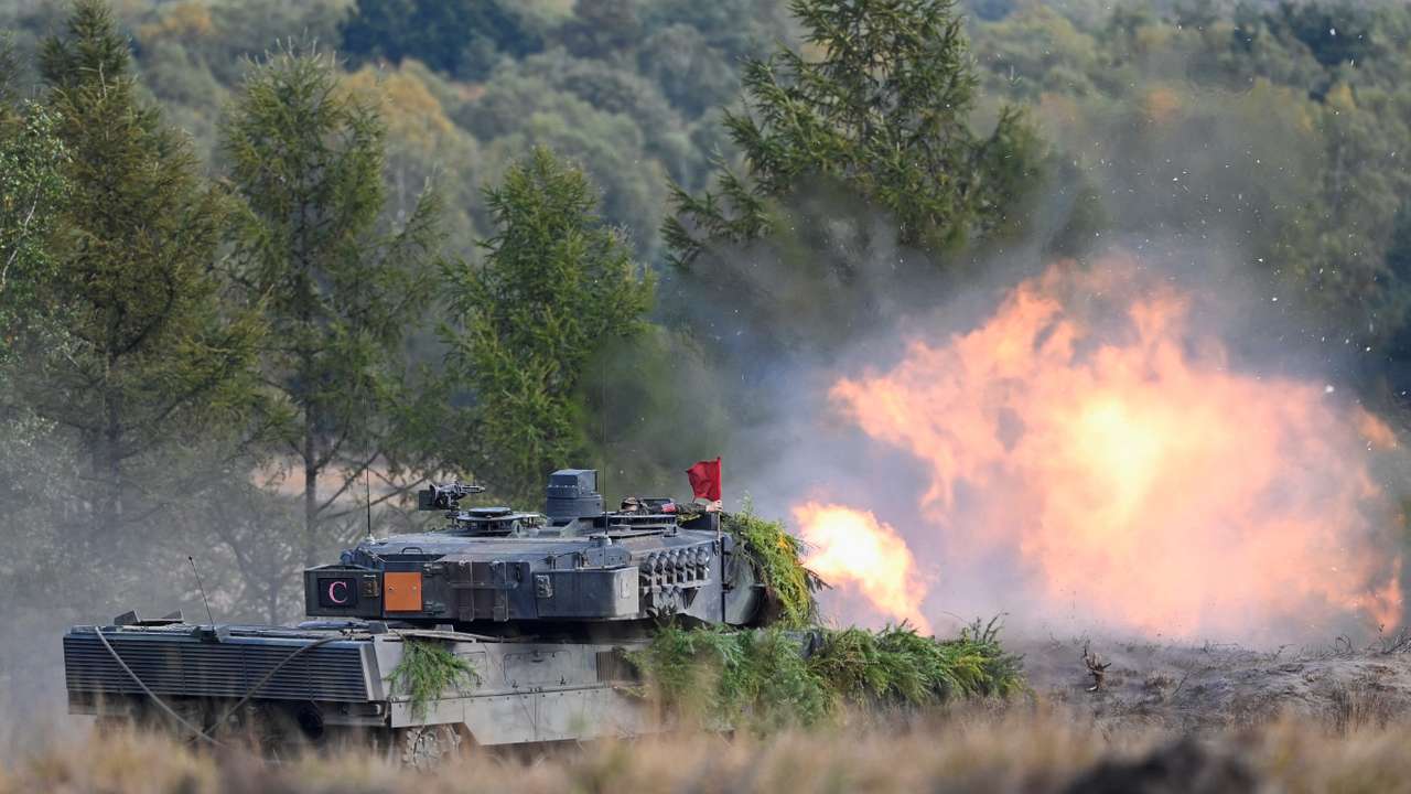 FILE PHOTO: German Chancellor Scholz visits German army training at a military base in Bergen