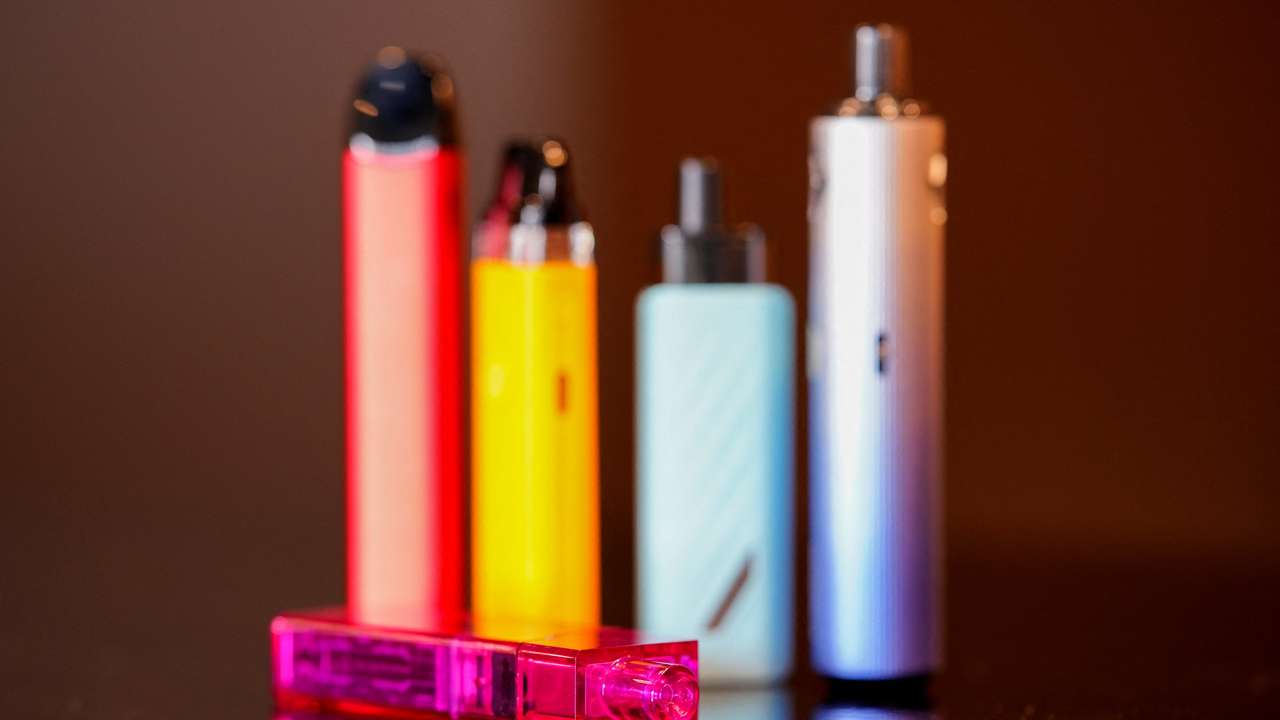 Vaping products stand on a vape store counter