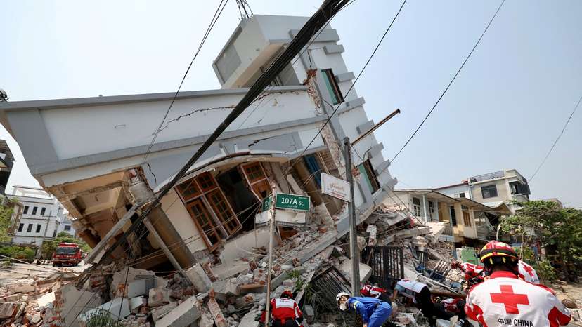FILE PHOTO: Chinese rescue personnel work following the earthquake, in Myanmar