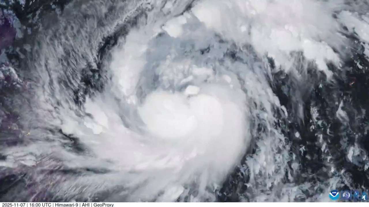 A satellite image shows Storm Fung-Wong, which has intensified into a typhoon