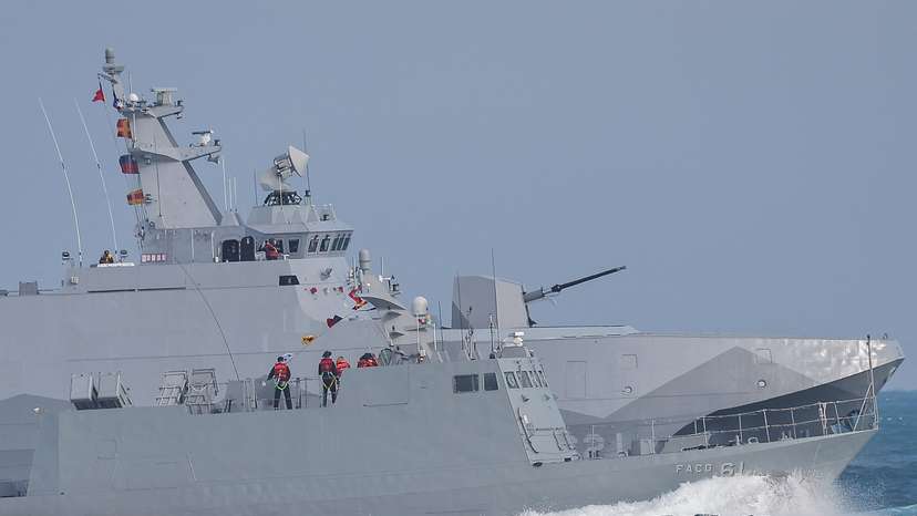 Navy personnel stand on board the Kuang Hua VI-class missile boat and Tuo Chiang-class corvette as the Taiwan military demonstrates combat readiness ahead of the upcoming Lunar New Year