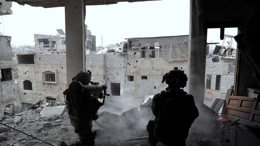 Israeli soldiers take part in an operation against Palestinian Islamist group Hamas, in a location given as Gaza