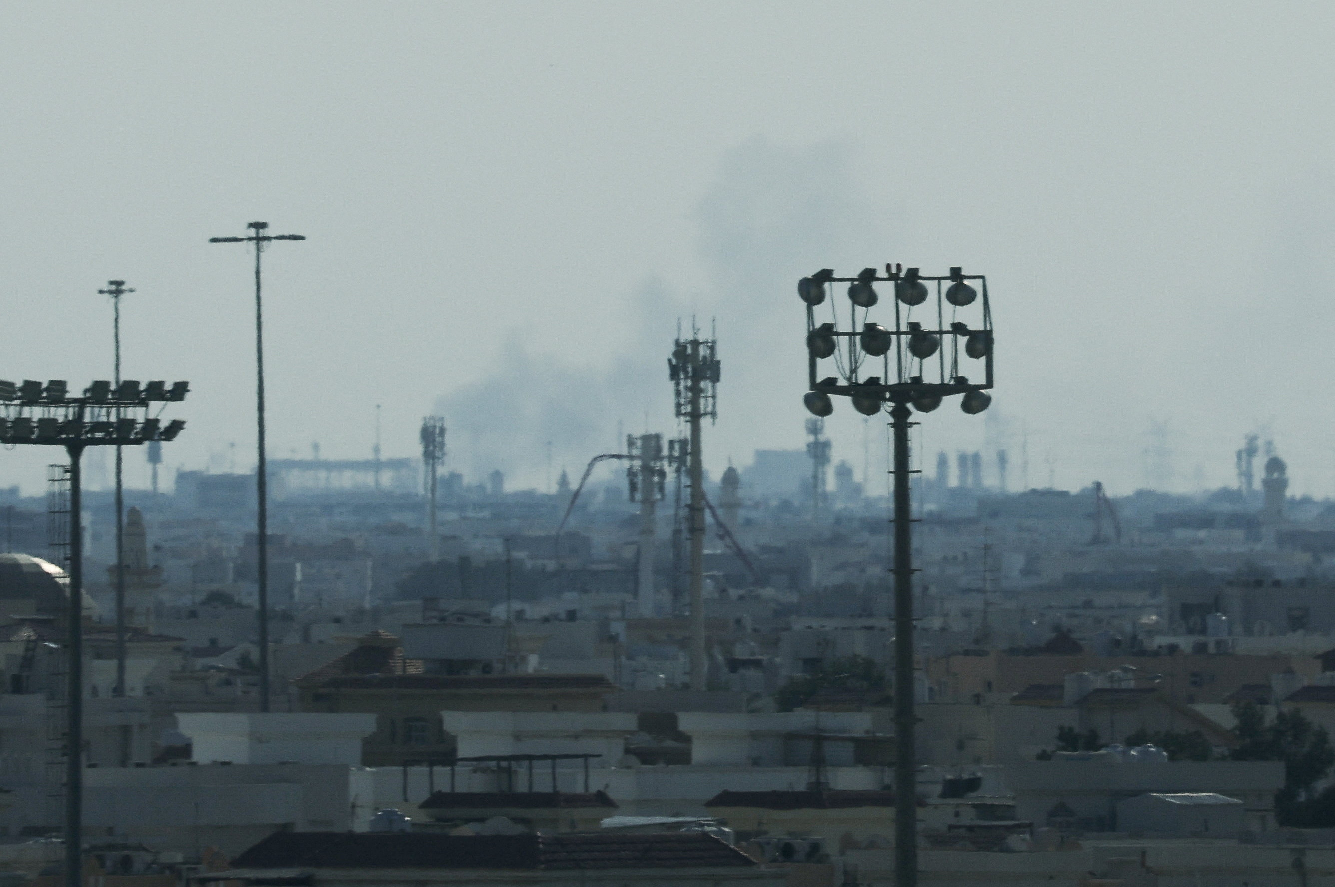 Smoke is left in the sky after reported Iranian missile attacks, following strikes by the United States and Israel against Iran, as seen from Doha