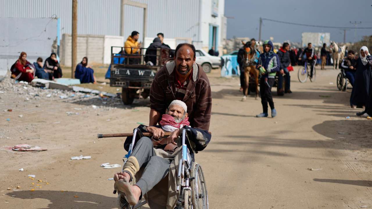 Palestinians arrive at Rafah after being evacuated from Nasser hospital