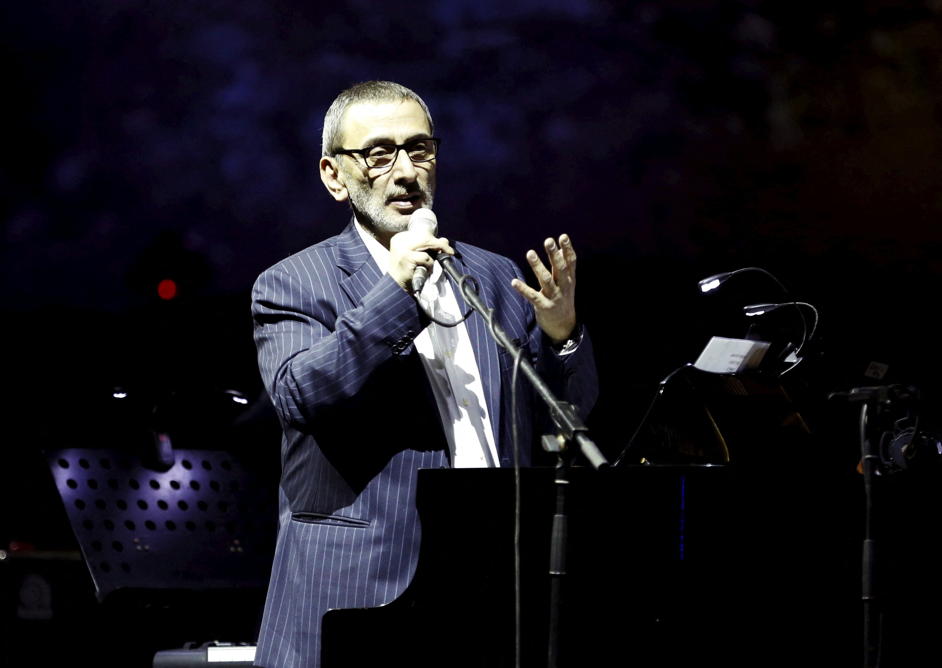 FILE PHOTO: Lebanese musician and composer Ziad Rahbani performs during a concert at the Ehdeniyat International Festival in Ehden town