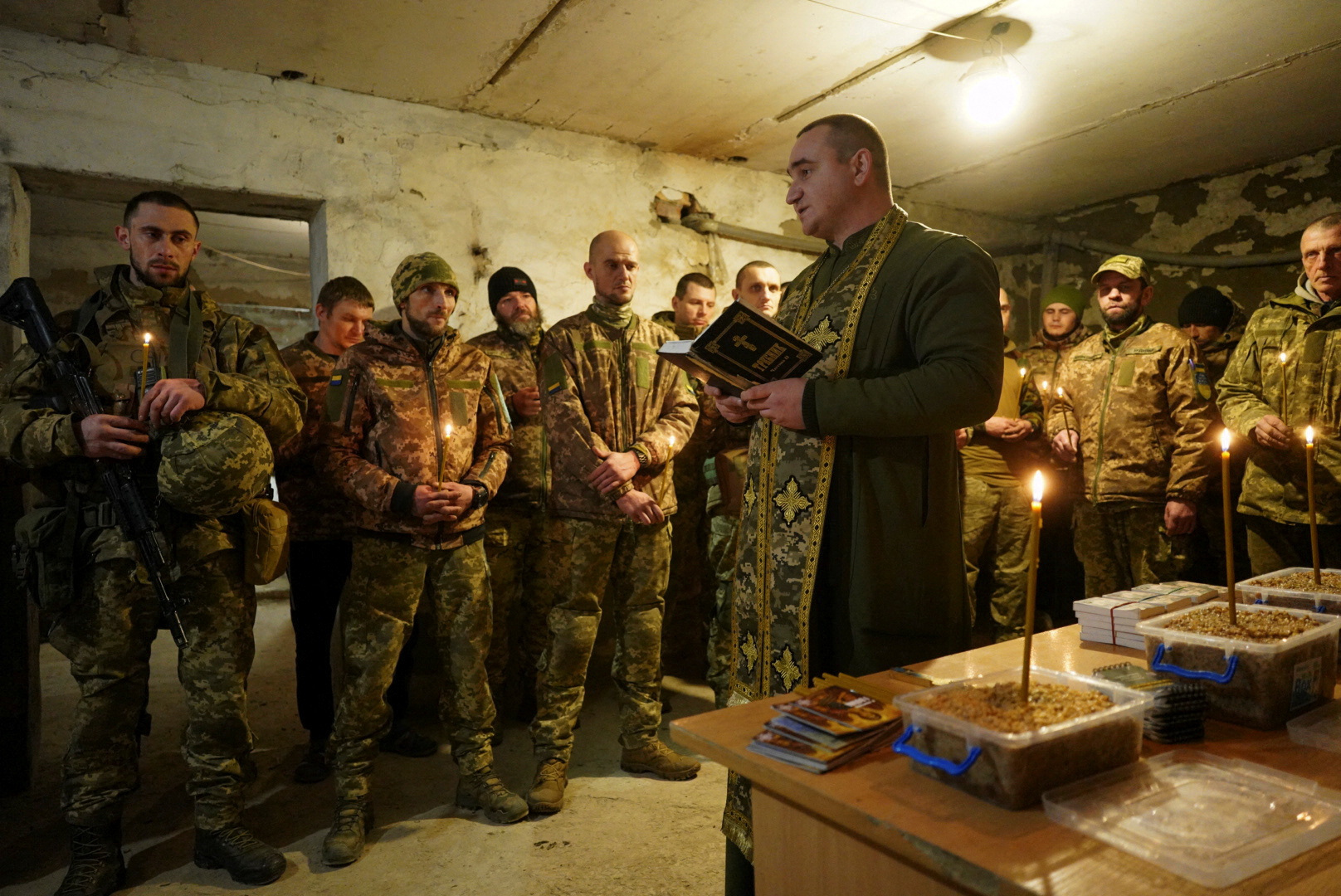 Ukrainian servicemen celebrate Christmas Eve in a front line in Donetsk region