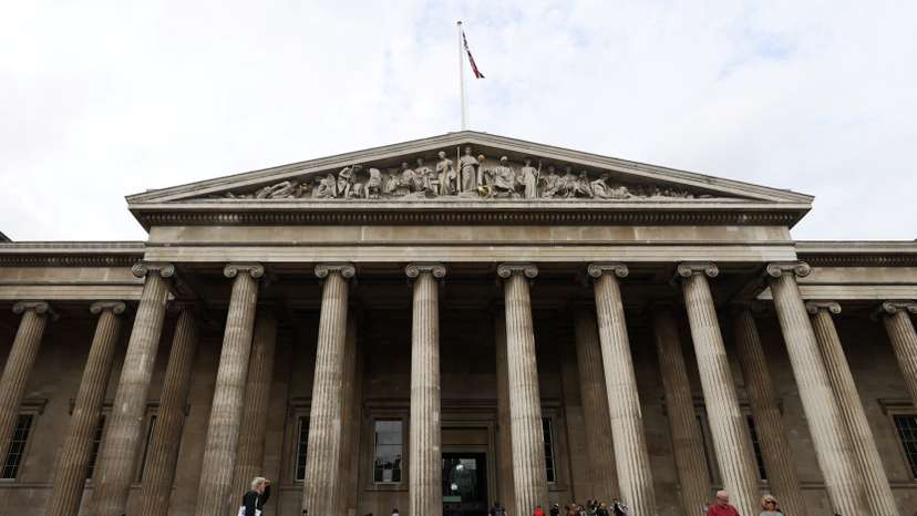 People walk in front of the British Museum in London