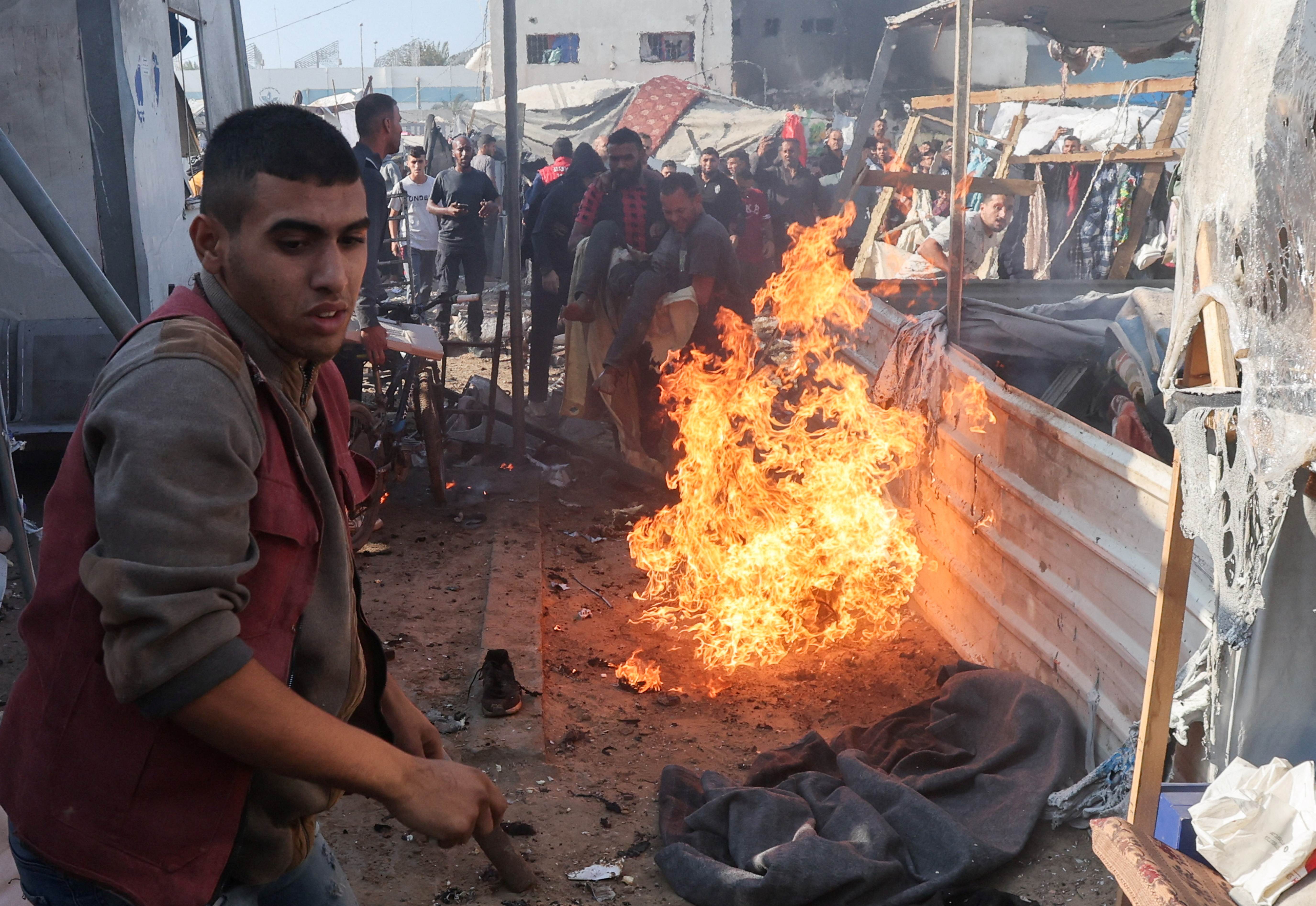Aftermath of an Israeli strike on a tent housing displaced people, at Al-Aqsa Martyrs Hospital in Deir Al-Balah