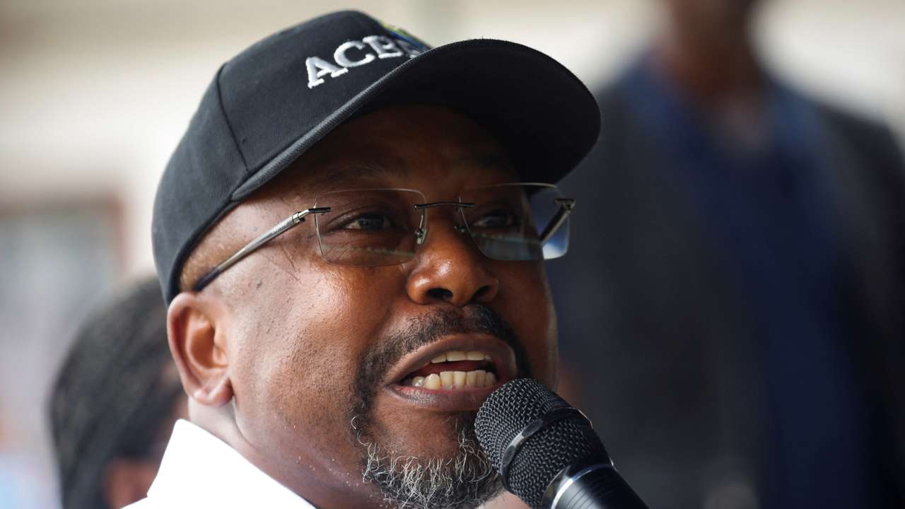 Alain Claude Bilie By Nze, former Prime Minister of Gabon, speaks during a meeting in Lambarene