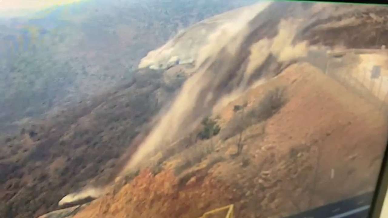 A CCTV monitor shows a landslide at an Anagold Mining operation in Ilic