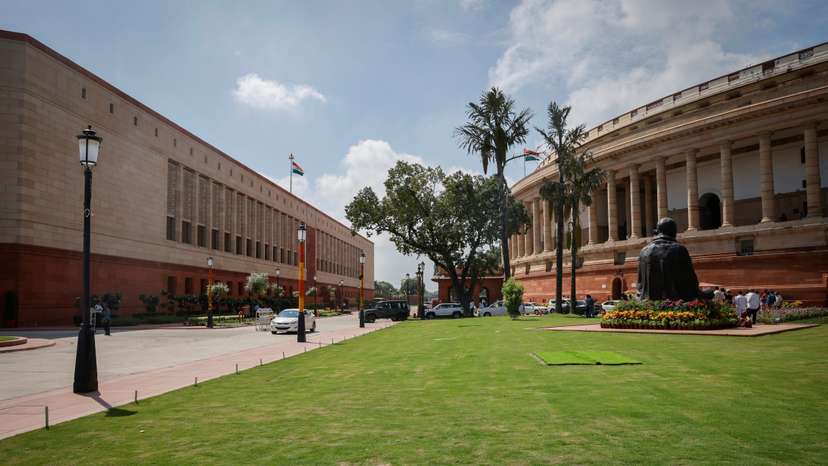 A view shows India's new (L) and old parliament buildings during the first day of the five-day long special session in New Delhi