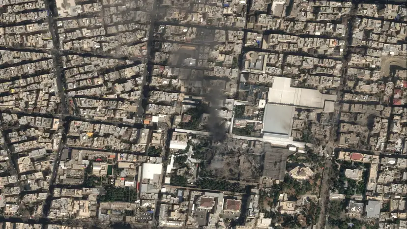 A satellite image shows black smoke rising and heavy damage at Iranian Supreme Leader Ayatollah Ali Khamenei's compound in Tehran
