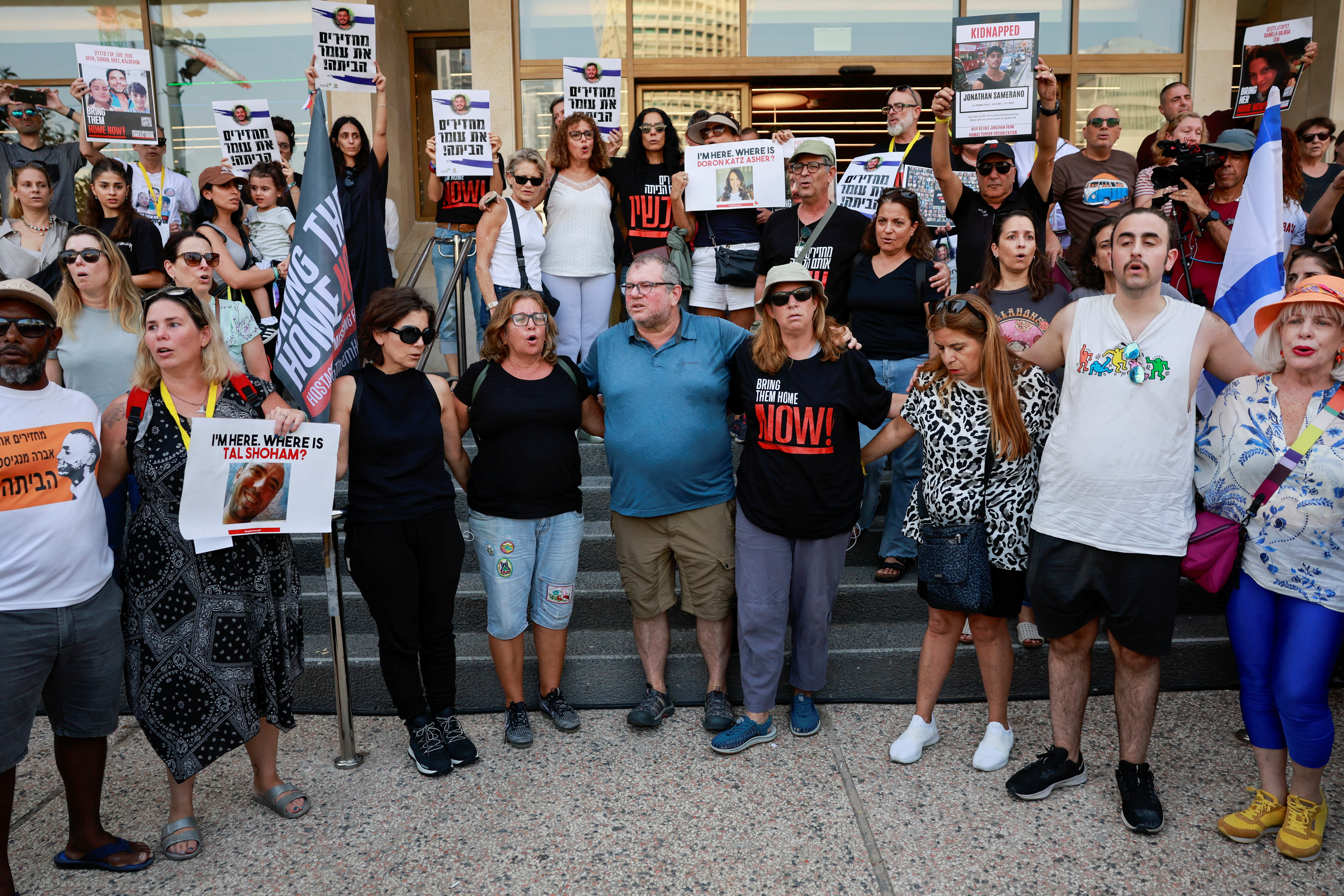 Families and supporters of hostages call for a dialogue with Israeli PM Netanyahu and Defence Minister Gallant, in Tel Aviv