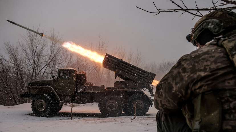 FILE PHOTO: Ukrainian servicemen fire a BM-21 Grad multiple-launch rocket system toward Russian troops on a front line near the town of Chasiv Yar