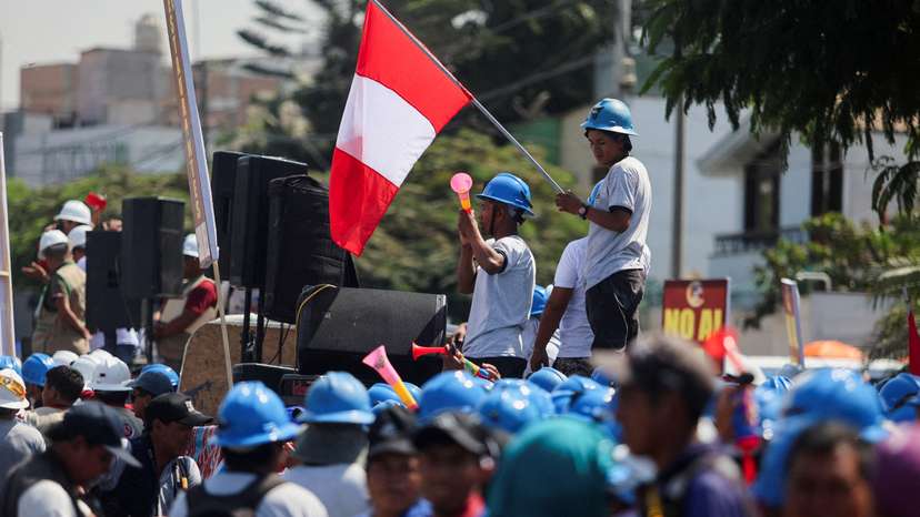 FILE PHOTO: Informal miners protest to demand the repeal of the law that prevents their formalization, in Lima