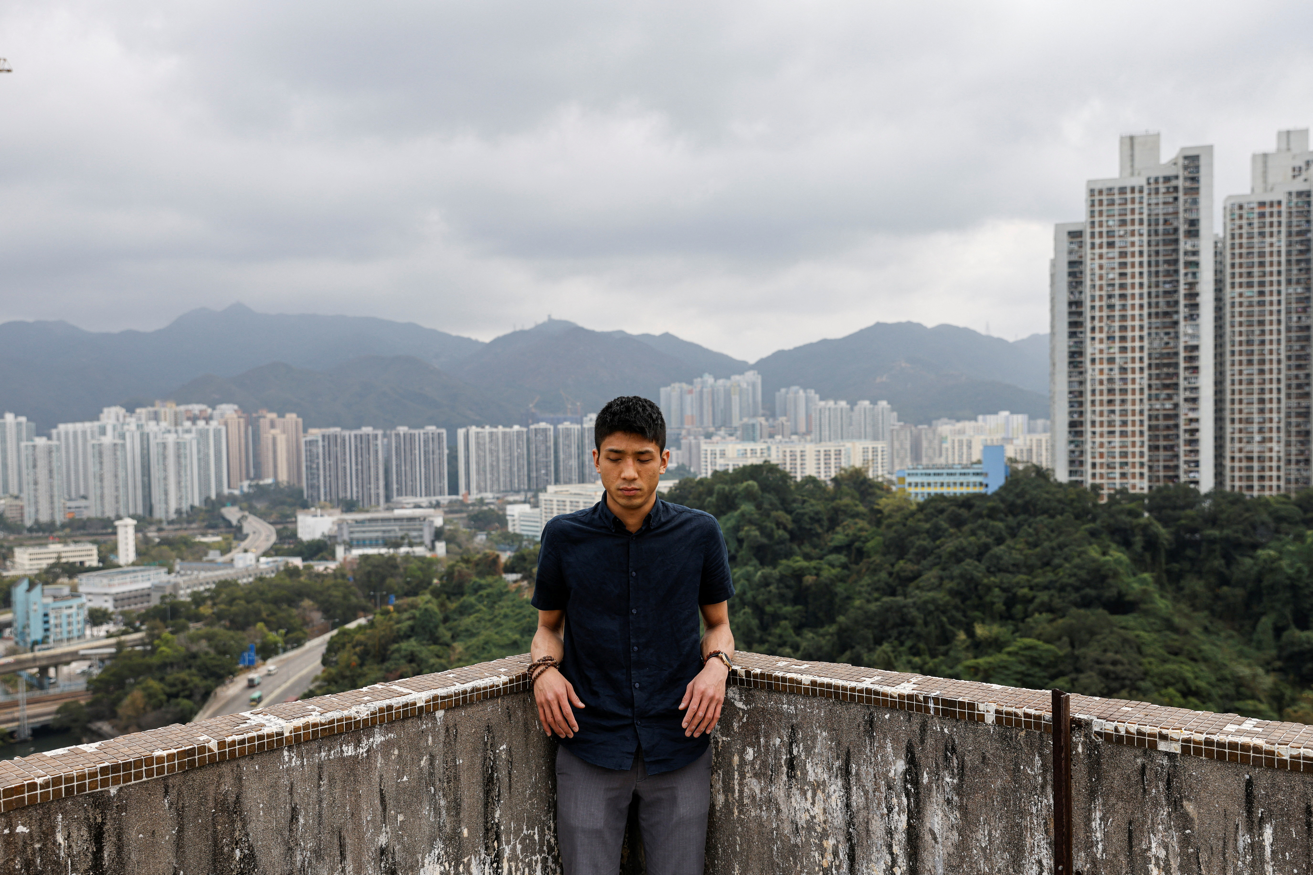 Pro-democracy activist Owen Chow reacts during an interview in Hong Kong
