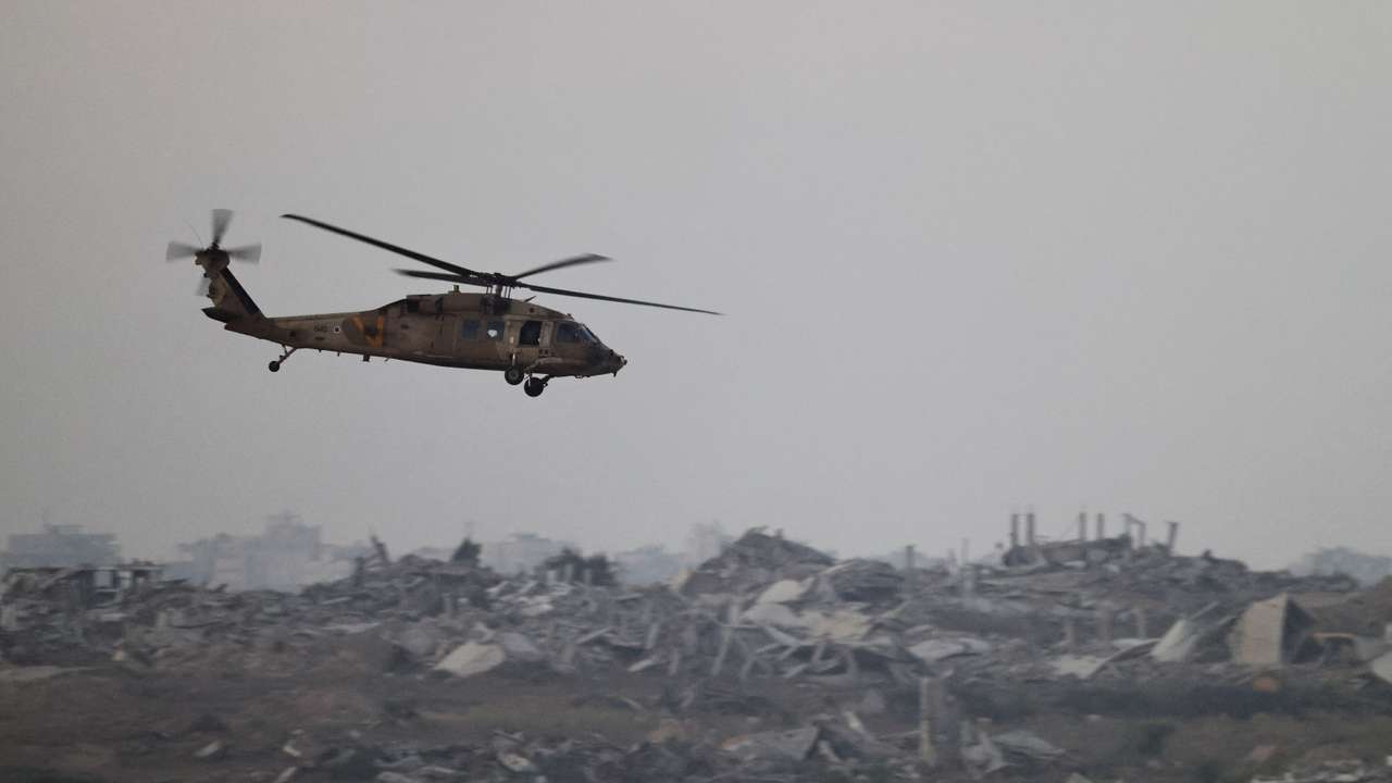 An Israeli Blackhawk evacuation helicopter flies over Gaza