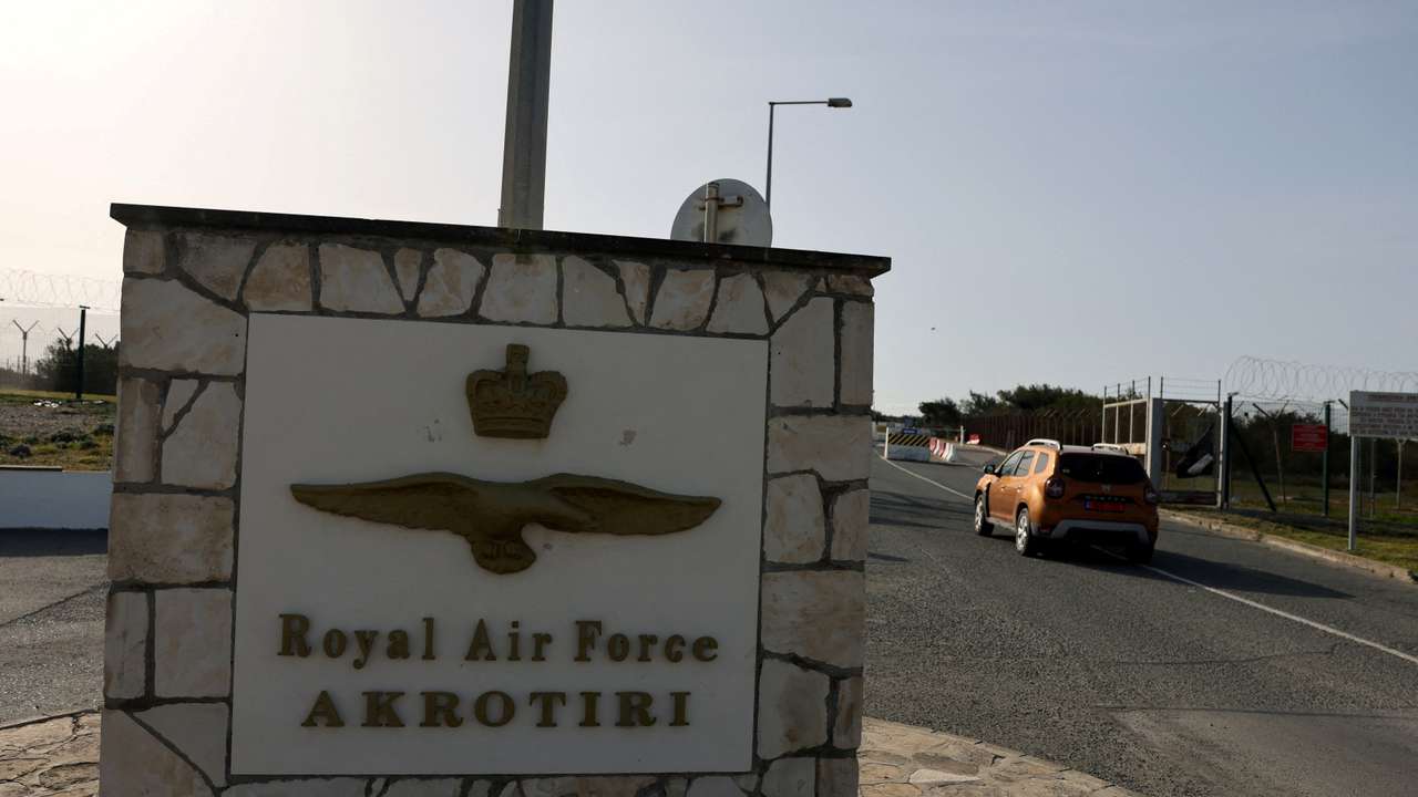 FILE PHOTO: A car drives in at the RAF Akrotiri, a British sovereign base in Cyprus that was hit by a drone early Monday, causing limited damage