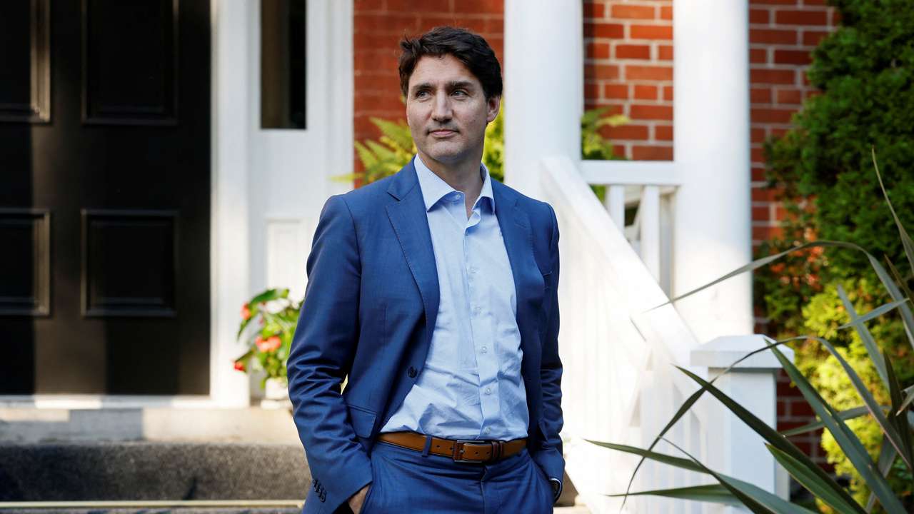 Canada's Prime Minister Justin Trudeau waits for the arrival of NATO Secretary-General Jens Stoltenberg at Rideau Cottage, Ottawa