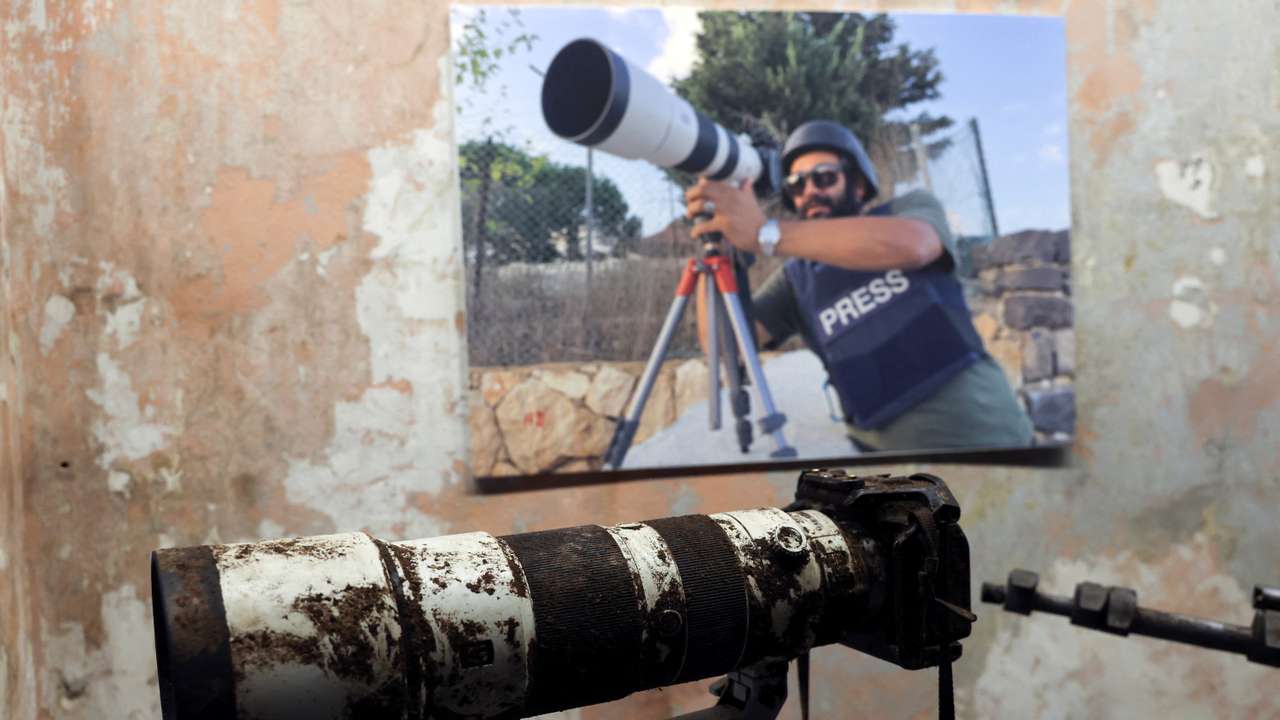 The camera that belonged to Reuters journalist Issam Abdallah is displayed during a press conference by Amnesty International and Human Rights Watch in Beirut