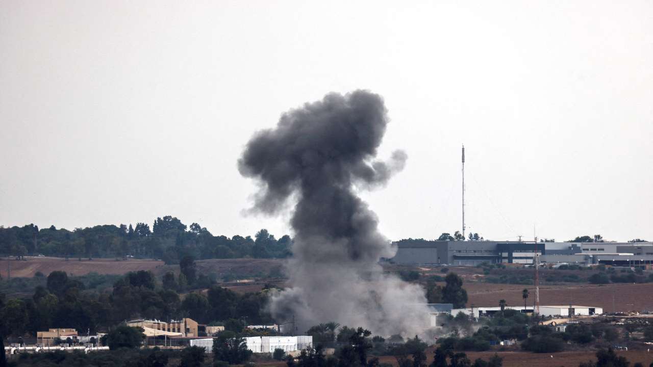 FILE PHOTO: A rocket launched from the Gaza Strip strikes an area near Sderot, southern Israel