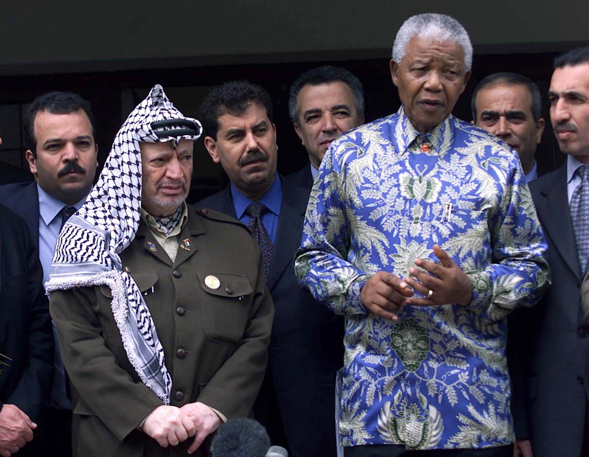 PALESTINIAN PRESIDENT YASSER ARAFAT AND FORMER PRESIDENT
NELSON MANDELA ADDRESSES MEDIA.