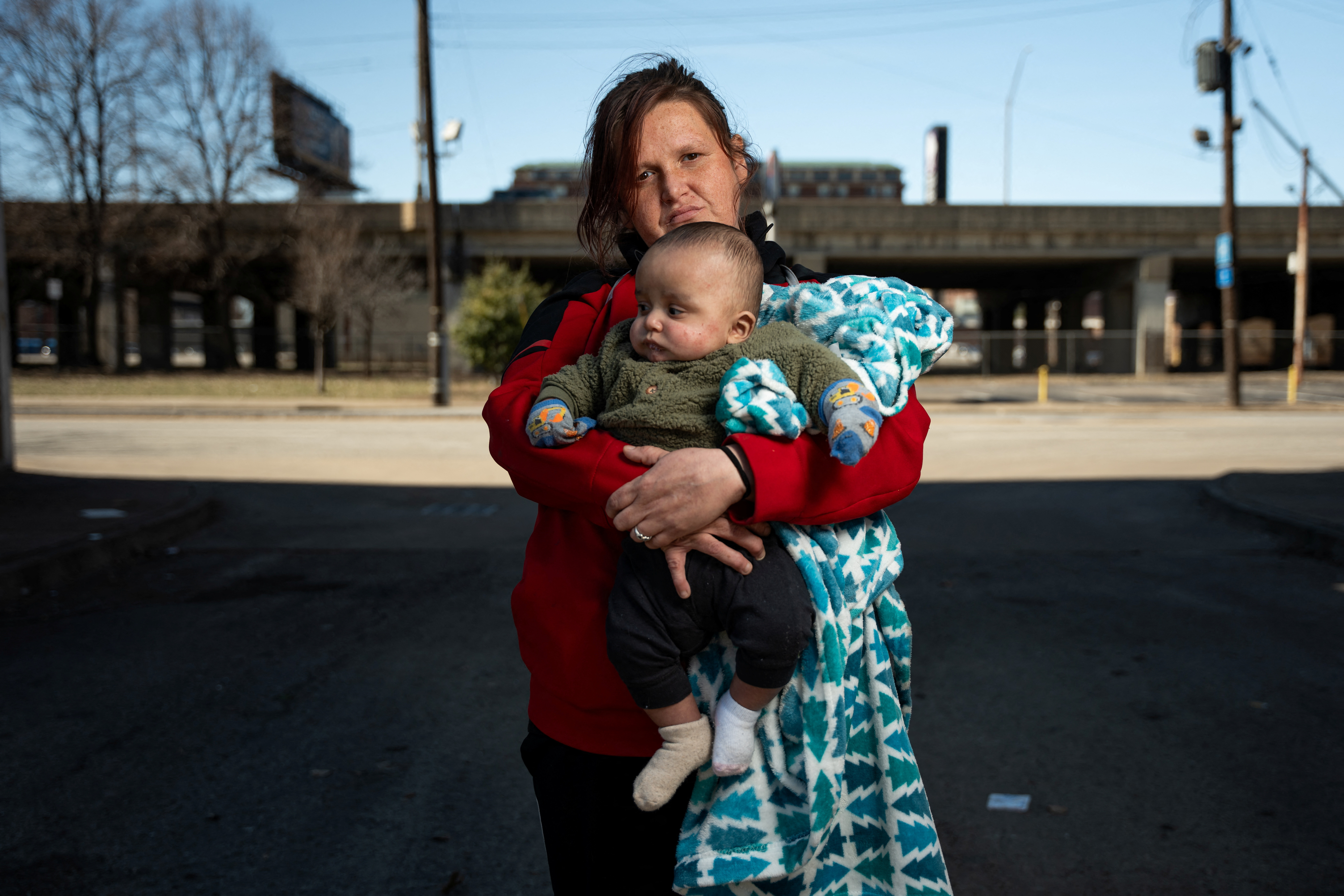 Samantha Crabtree poses for a portrait with her five-month-old son in Louisville