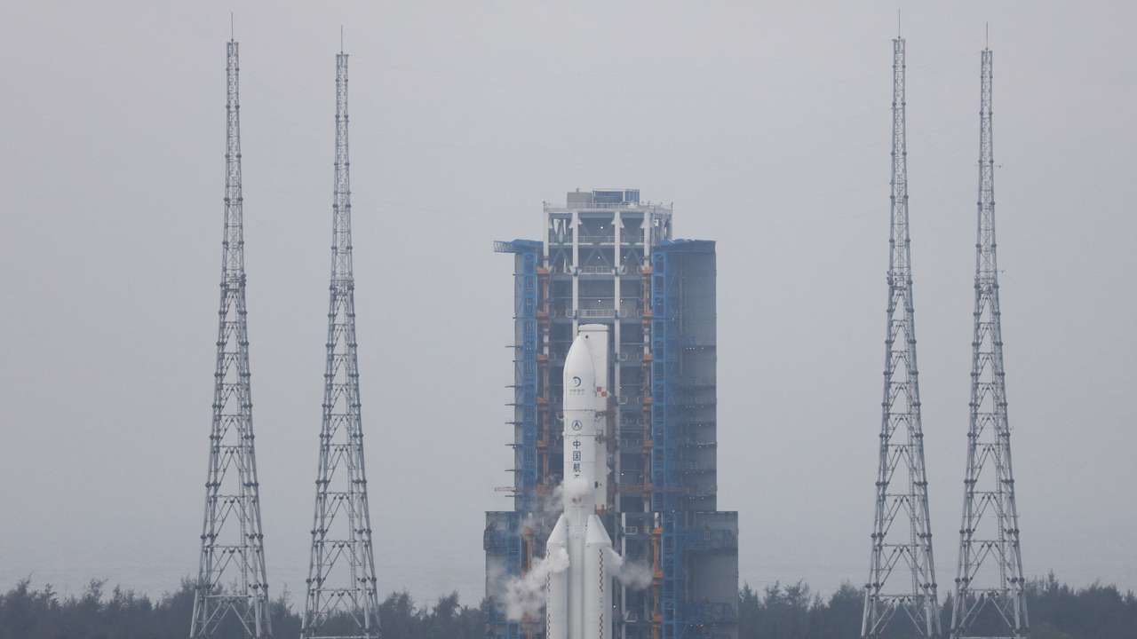 The Chang'e 6 lunar probe and the Long March-5 Y8 carrier rocket combination sit atop the launch pad at the Wenchang Space Launch Site in Hainan province