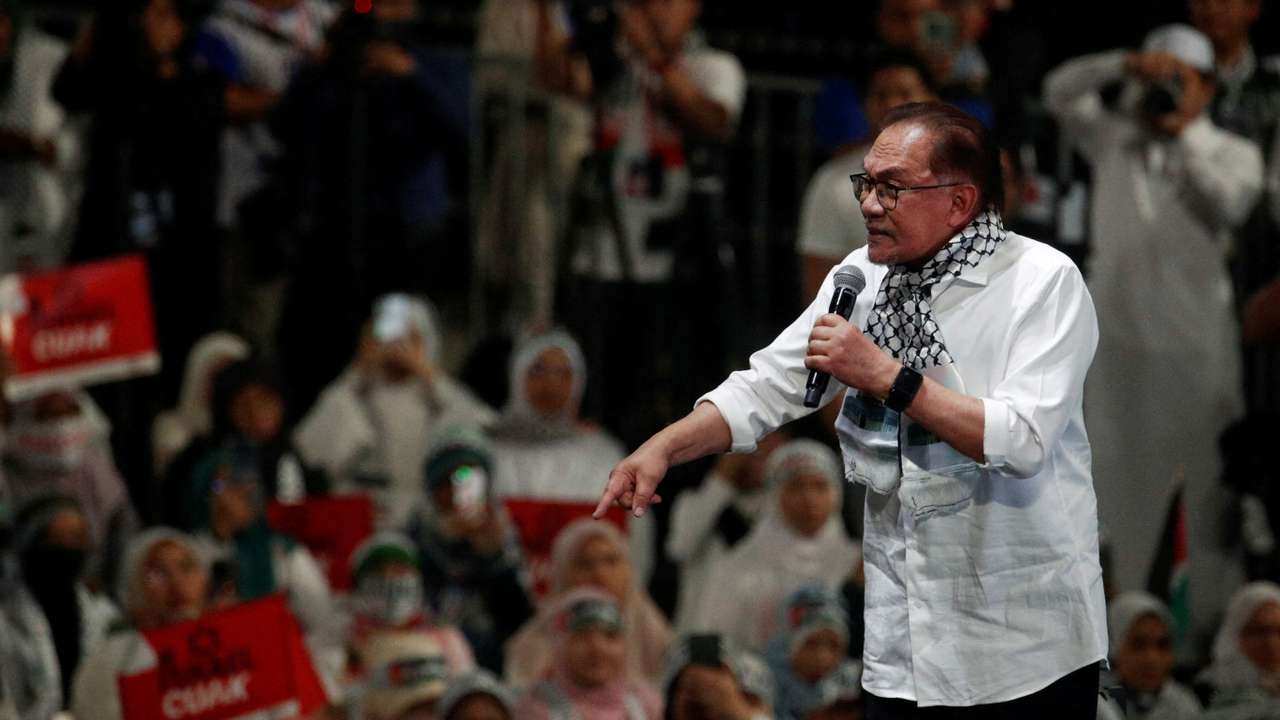 FILE PHOTO: Malaysia Prime Minister Anwar Ibrahim delivers his speech during a solidarity gathering to show support for Palestinians in Kuala Lumpur
