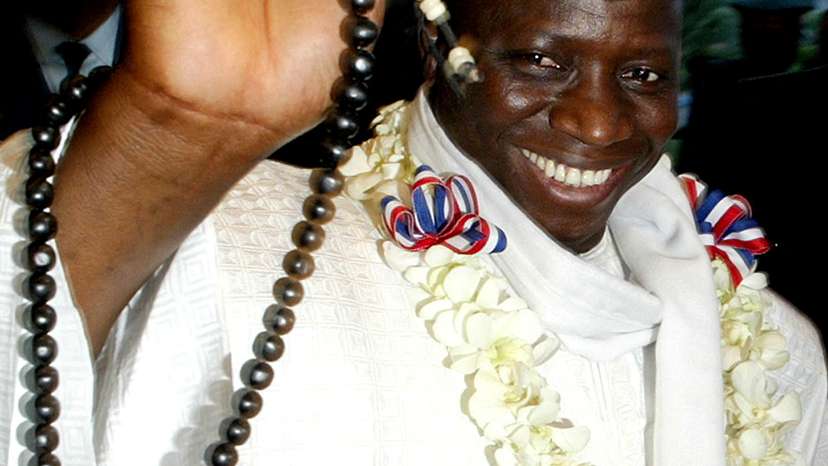 FILE PHOTO: Former Gambia President Yahya Jammeh waves during his arrival in Manila. in 2005