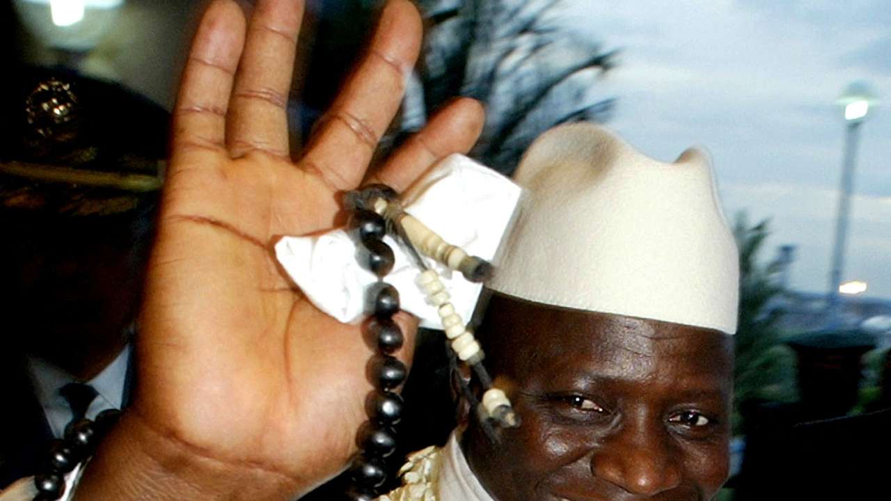 FILE PHOTO: Then Republic of Gambia President Yahya Jammeh waves during his arrival in Manila June 20, 2005. Jammeh was forced to flee his country in January 2017 after an election defeat. REUTERS/Cheryl Ravelo/File Photo