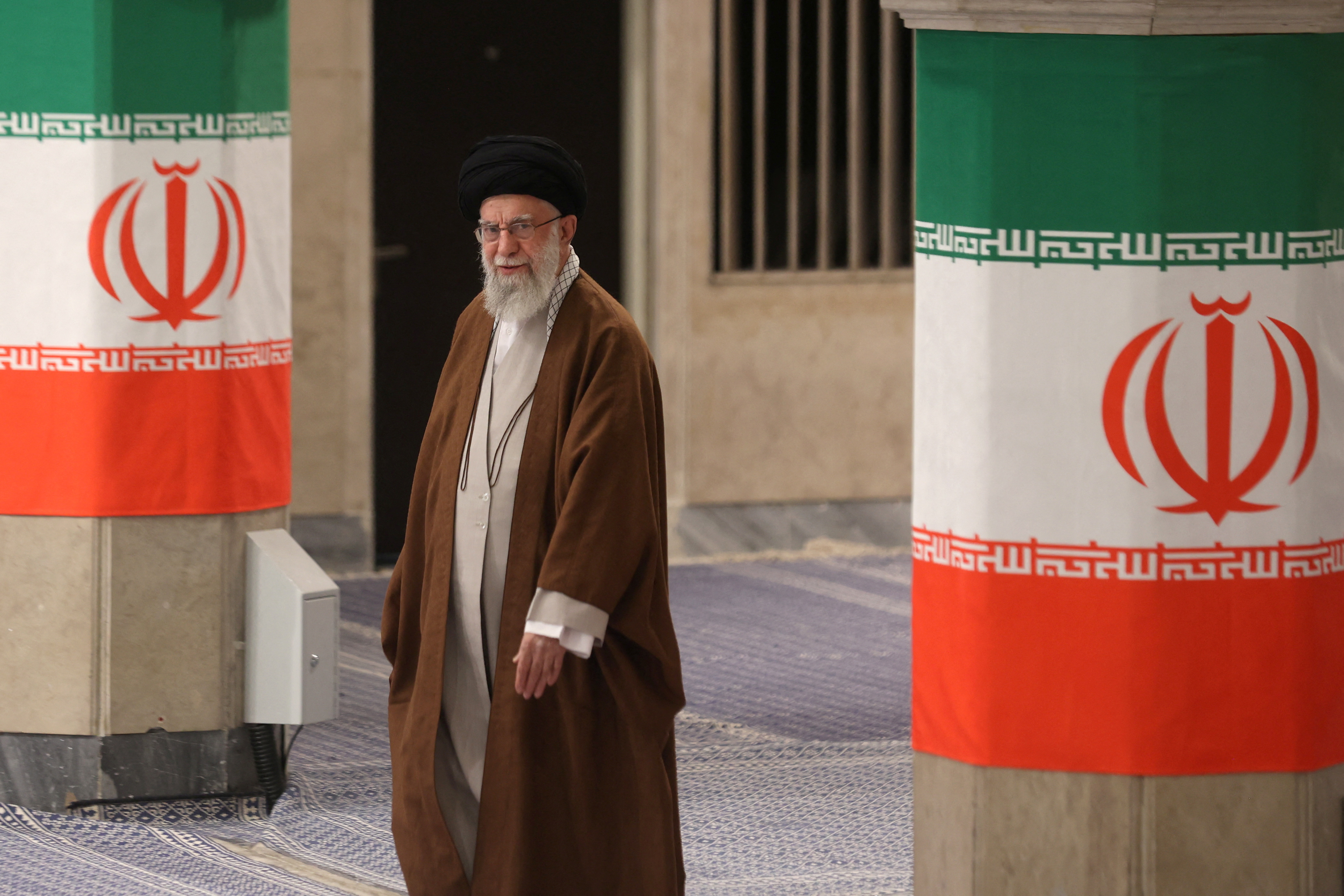 Iran's Supreme Leader Ayatollah Ali Khamenei votes during runoff parliamentary election, in Tehran