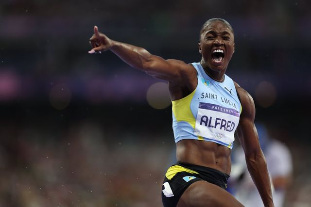 Julien Alfred celebrating her victory
