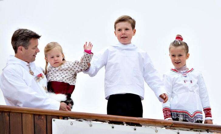 FILE PHOTO: Denmark's Crown Prince Frederik, Princess Josephine, Prince Christian and Princess Isabella on the Royal Ship during a visit to Qaqortoq, in 2014