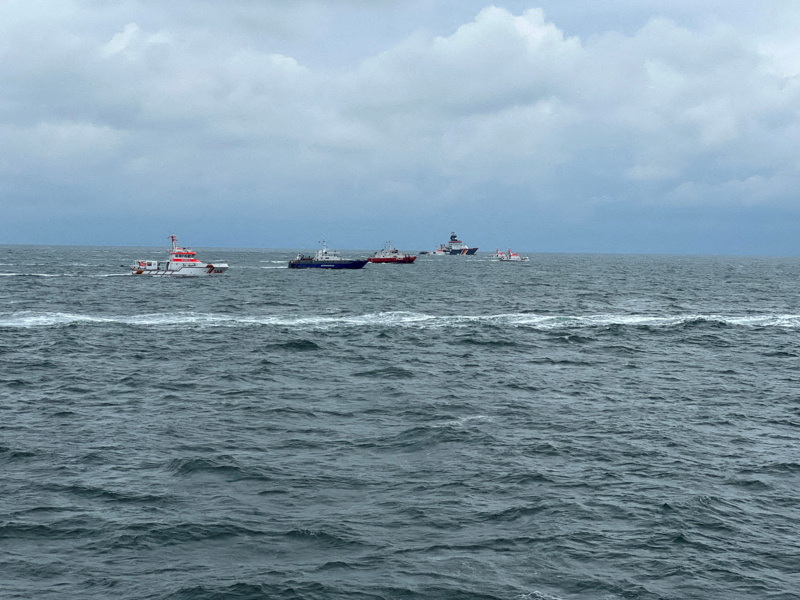 Rescue ships search for survivors following a ship collision in the North Sea near the German island of Helgoland