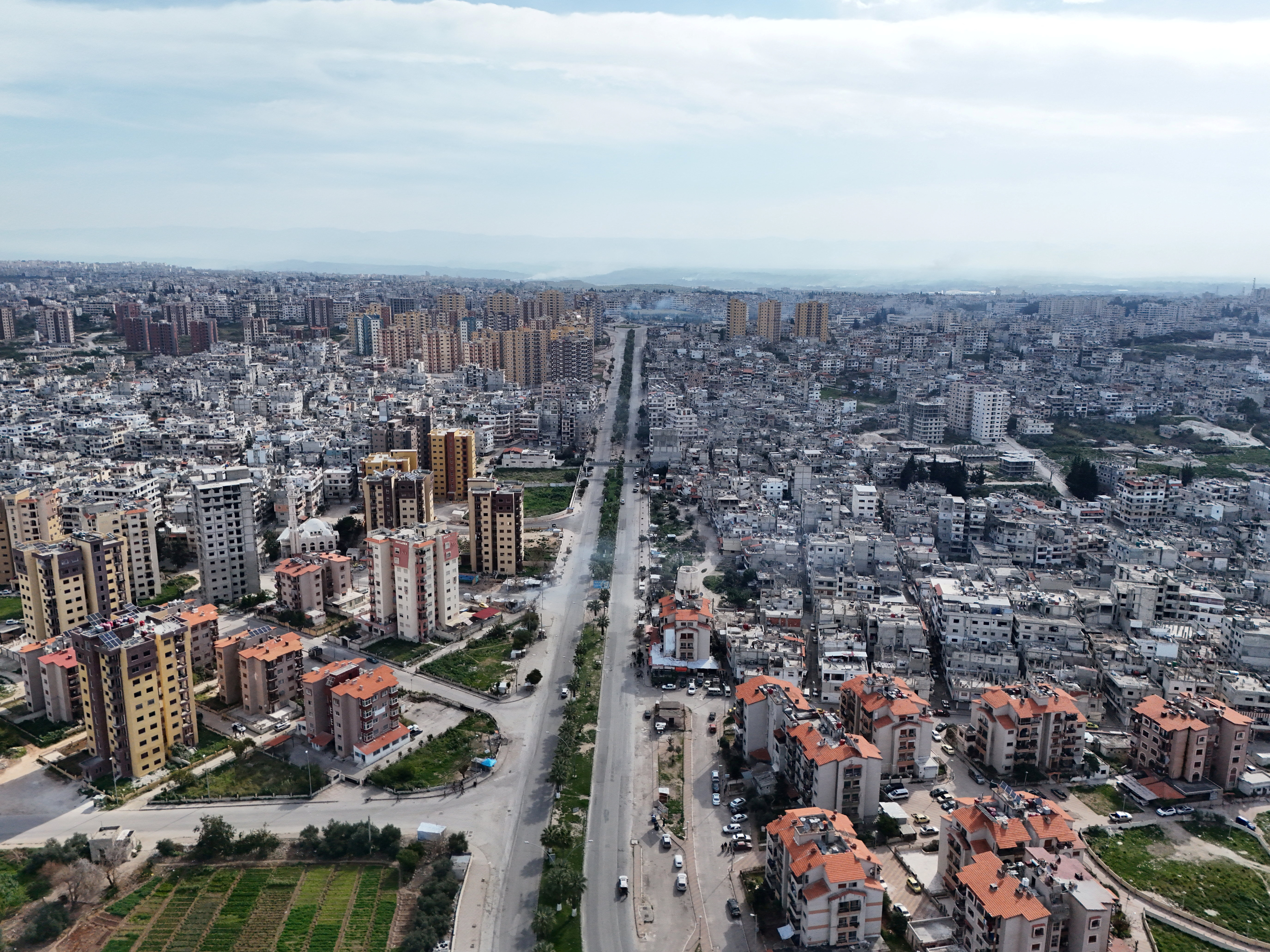 A drone view shows residential buildings in Latakia