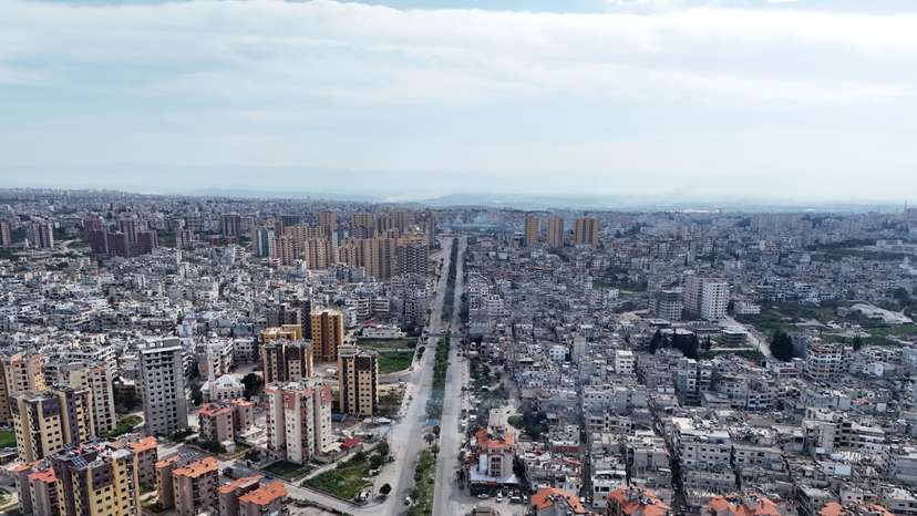A drone view shows residential buildings in Latakia