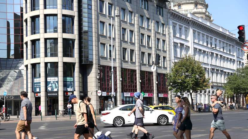 Tourists pull their suitcases in downtown Budapest