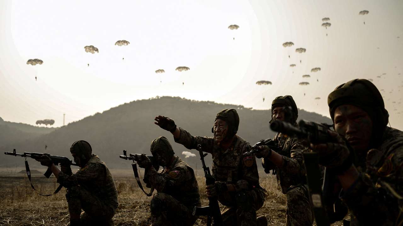 North Korean leader Kim Jong Un guides the training of the Korean People's Army's air and amphibious combat units