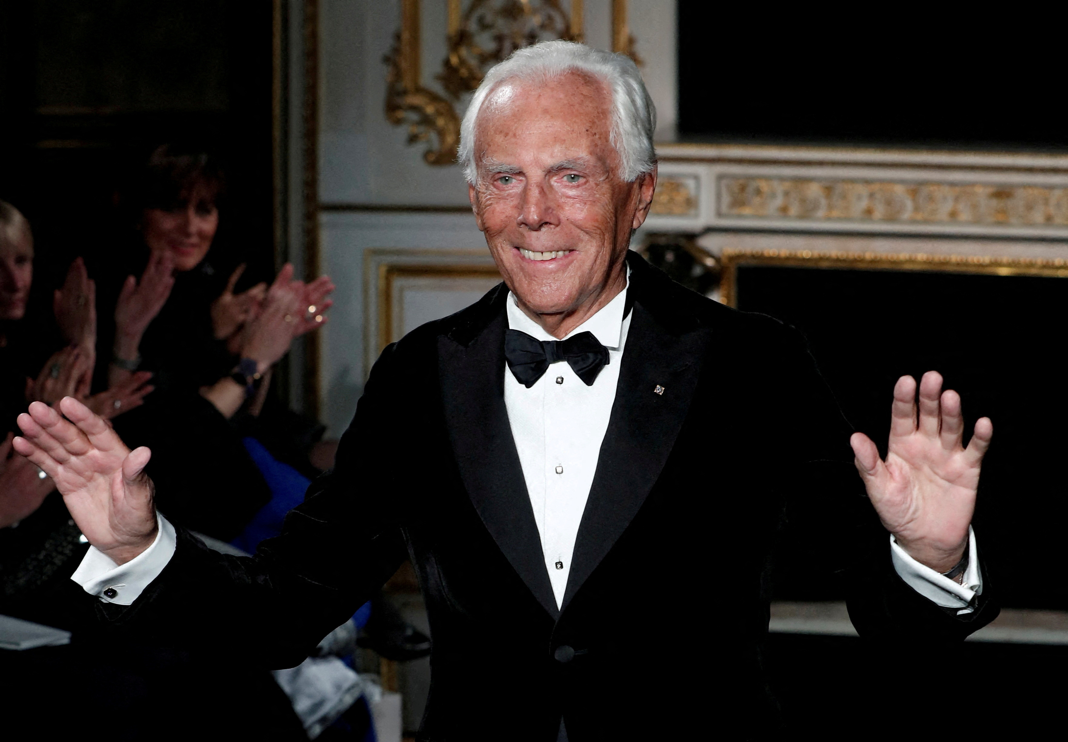 FILE PHOTO: Italian designer Giorgio Armani appears at the end of his Haute Couture Spring-Summer 2019 collection show for fashion house Giorgio Armani Prive in Paris
