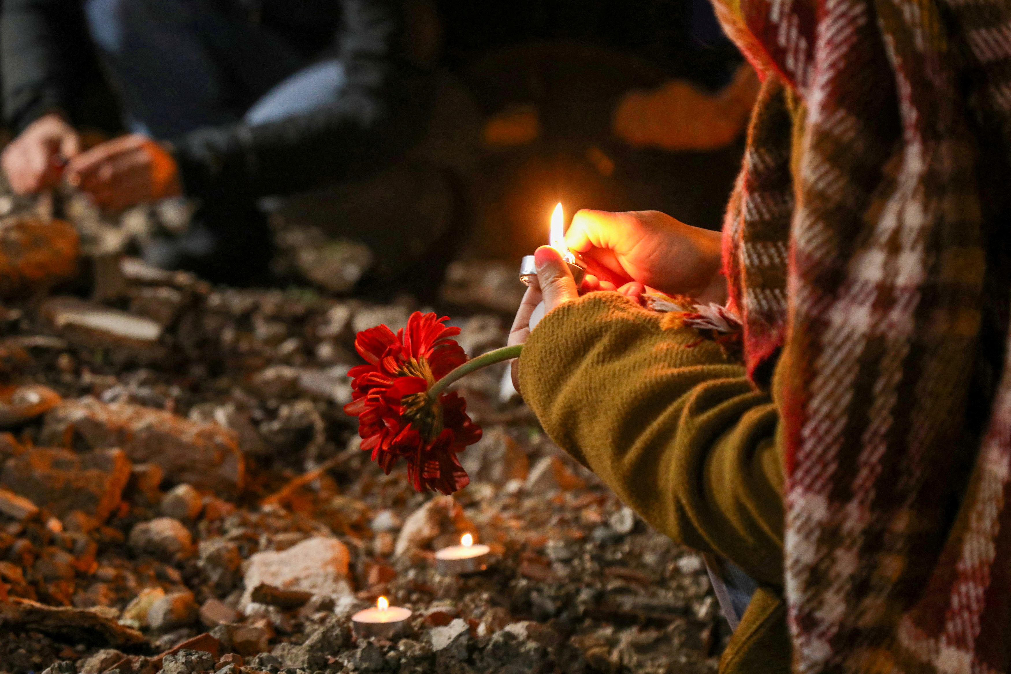 People gather to commemorate the two-year anniversary of the devastating earthquake, in Diyarbakir