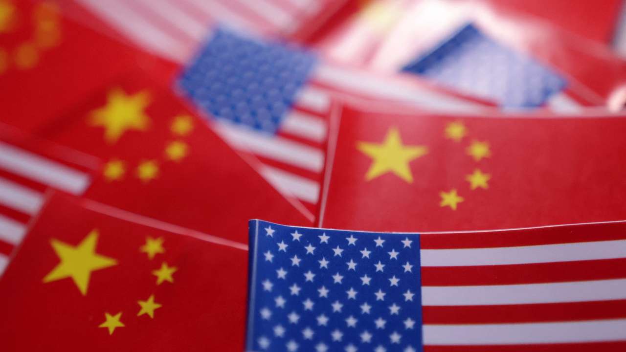 Illustration shows U.S. and Chinese flags