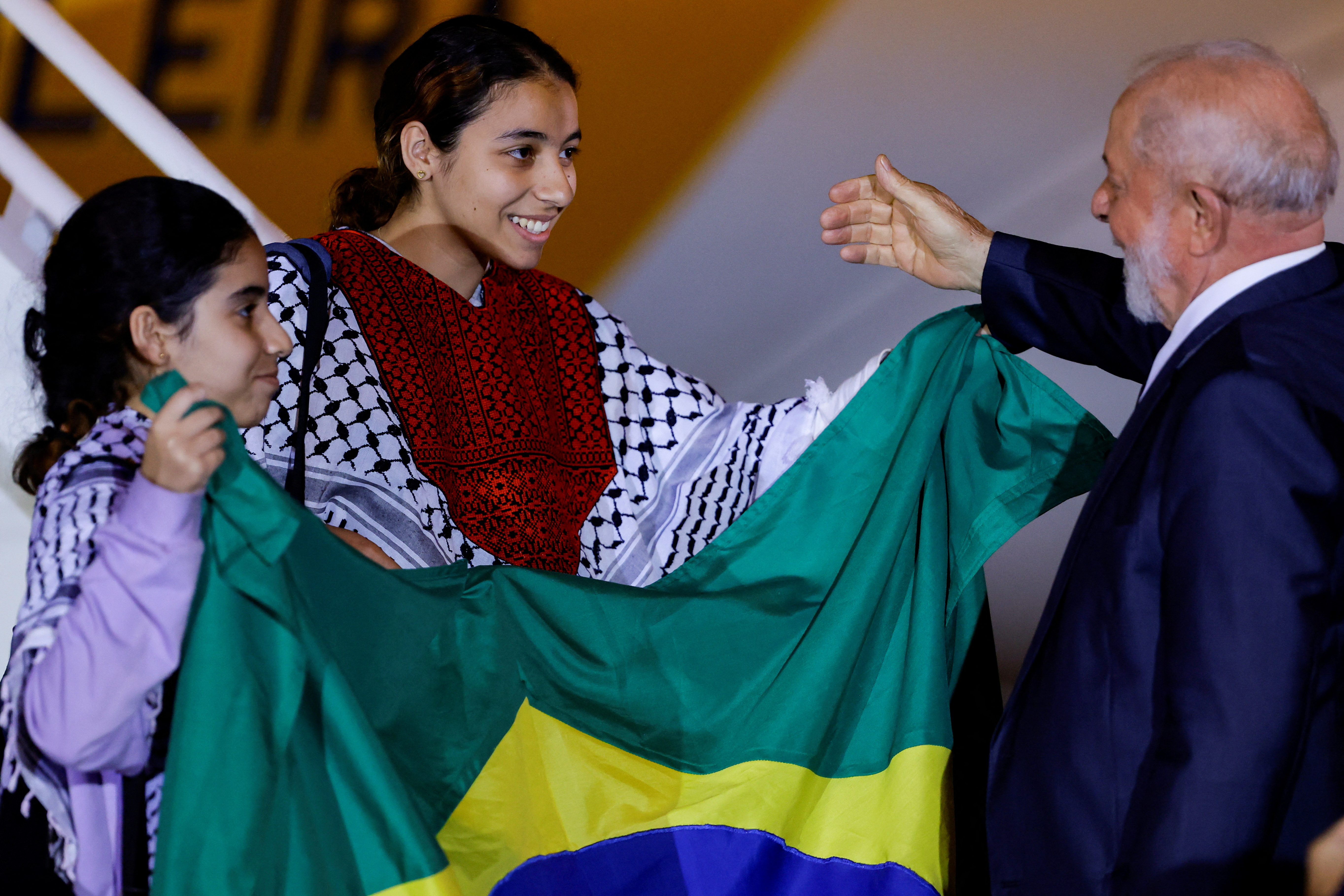 Brazilians evacuated from the Gaza Strip are welcomed by Brazil's President Luiz Inacio Lula da Silva in Brasilia