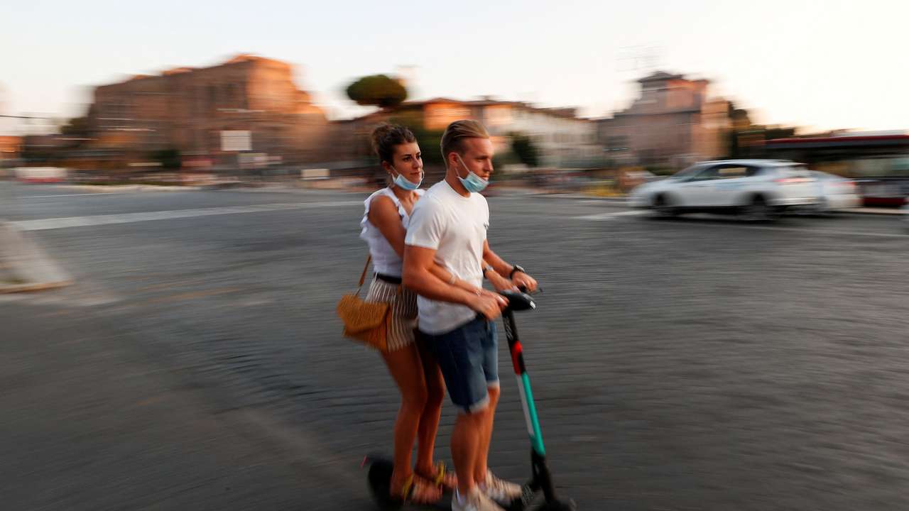 FILE PHOTO: E-scooters gone wild! Rome boosts electric mobility amid lax rules