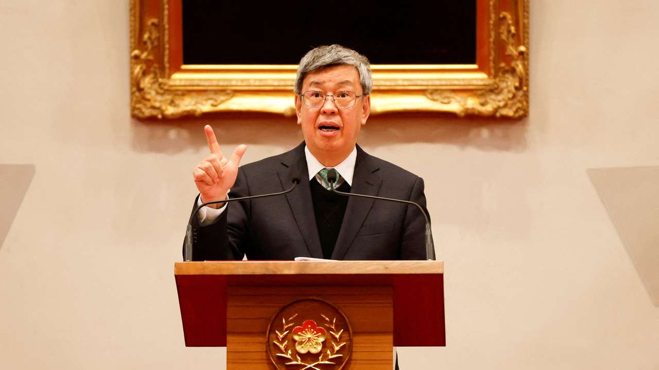 FILE PHOTO: Incoming Taiwan Premier Chen Chien-jen speaks during a news conference with Taiwan President Tsai Ing-wen and outgoing Taiwan Premier Su Tseng-chang at the presidential office in Taipei