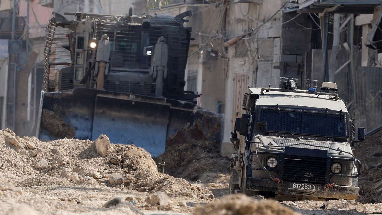 Israeli military vehicles operate during an Israeli raid in Tulkarm