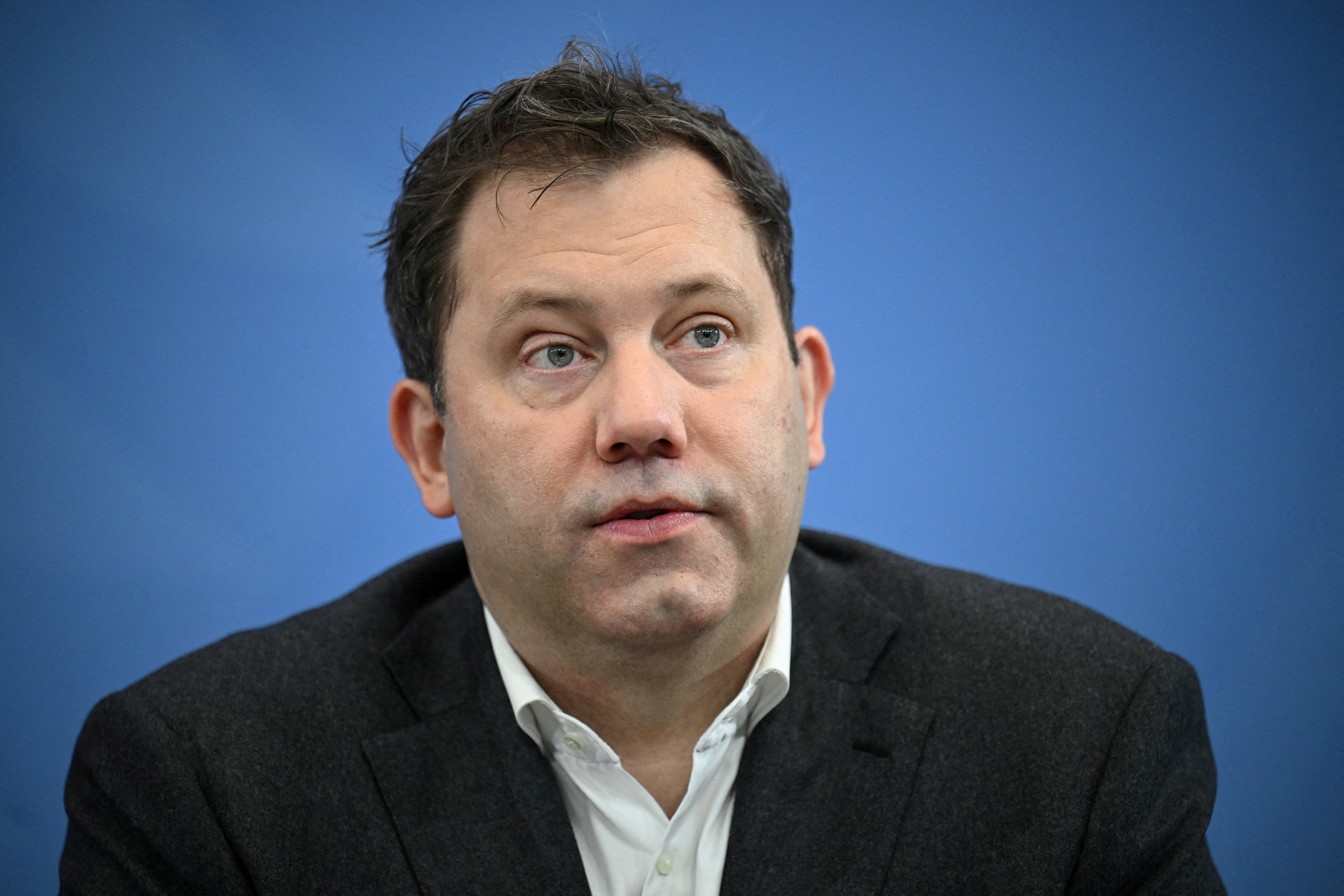 FILE PHOTO: Germany's Merz and coalition leaders attend a press conference following talks, in Berlin