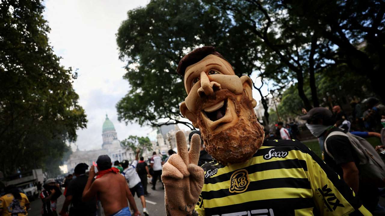 Football fans join the weekly protest of retirees against Argentinian President Milei's adjustment policies, in Buenos Aires