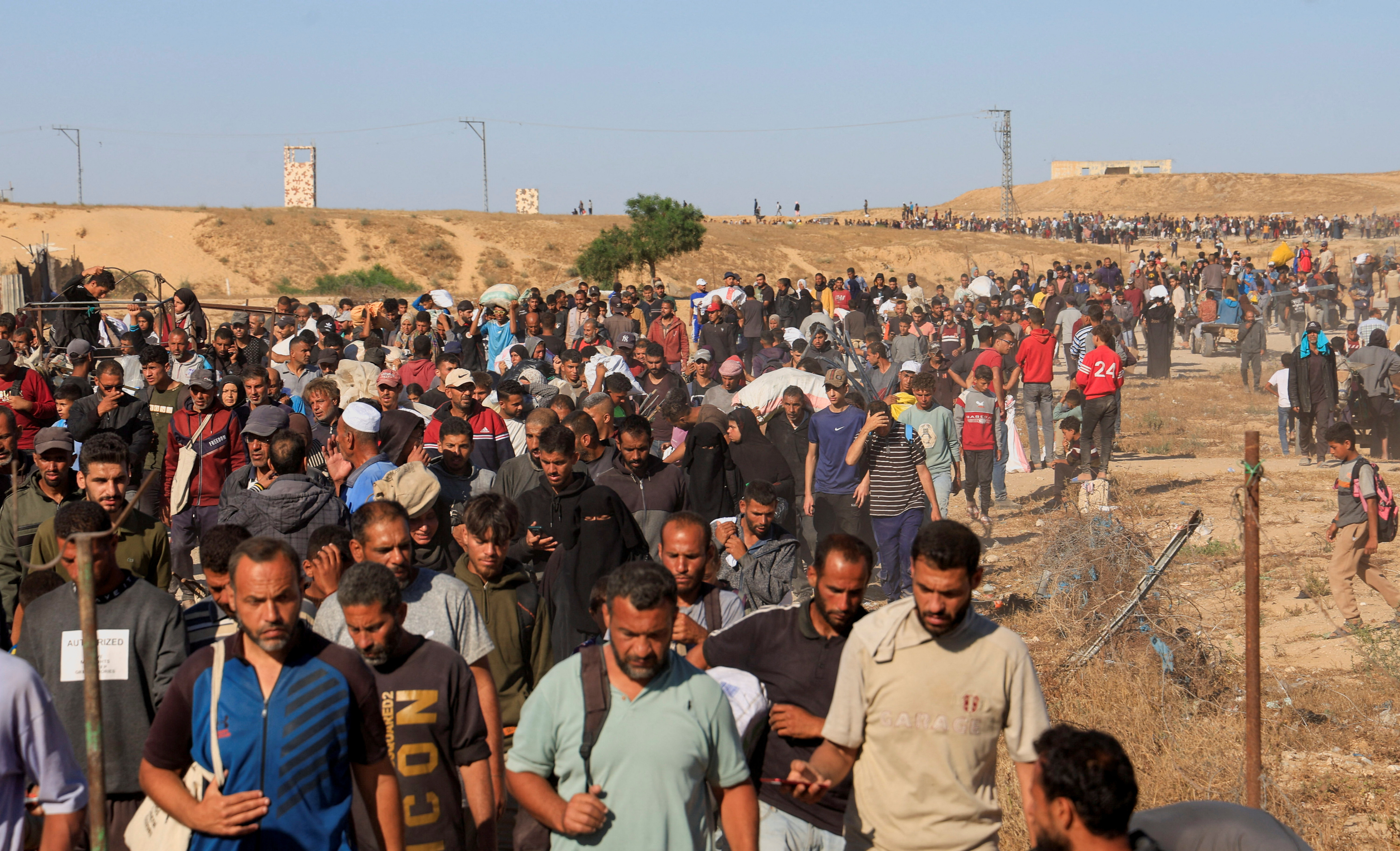 Visual story on the ordeal Gazans endure to get food under new aid distribution programme in Khan Younis